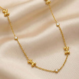 Gold Bow Station Choker Necklace